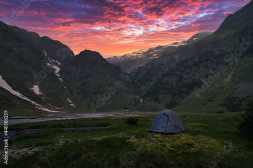 beautiful sunset in the mountain with tent, trekking, wild life