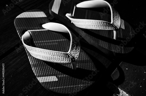 Black and white flip flops