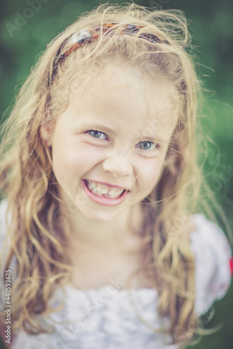 dreamy portrait of a young girl outdoor