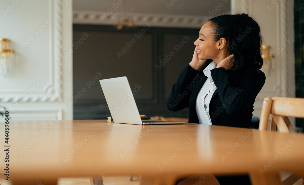 The accountant calculates the credit in the online table. Female manager smiles working at home on the computer. Prints an email message to the client. Online distance learning via video link. The accountant calculates the credit in the online table. Female manager smiles working at home on the computer. Prints an email message to the client. Online distance learning via video link.