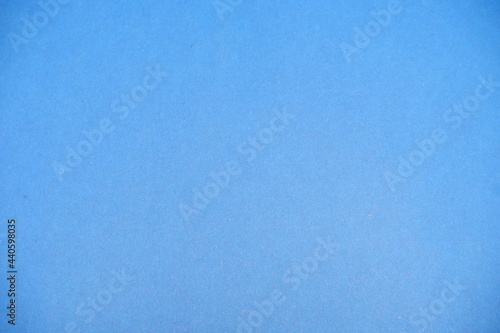 Blue background. Suitable for backgrounds. The texture of the cardboard.