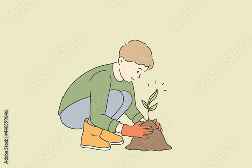 Ecological care and growing plants concept. Little boy cartoon character in gloves sitting growing taking care of green plant seed working with ground vector illustration 