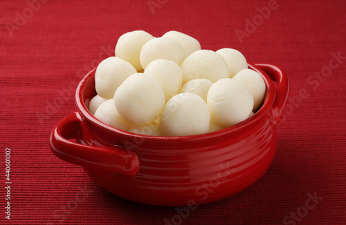 This dessert is called Rasgulla or Rosogolla, Indian Sweet ,Famous Bengali sweet photo