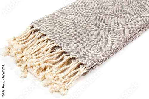 Peshtemal Turkish towel folded colorful textile for spa, beach, pool, light travel, healthy fashion and gifts. Traditional turkish bath material, scarf photo