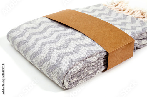 Soft peshtemal Turkish towel folded colorful textile for spa, beach, pool, light travel, healthy fashion and gifts. Traditional turkish bath material, scarf