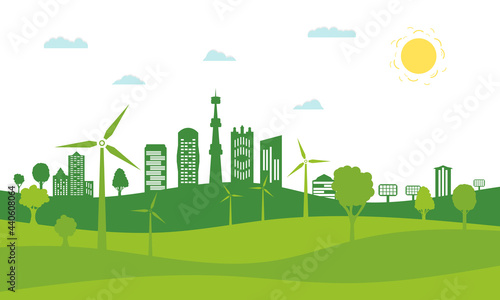 Concept green city with renewable energy sources. Ecological city  environment conservation. Green city with green trees  wind energy and solar panels