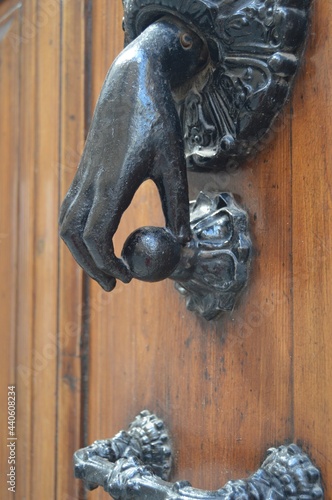 Old Lecce, Italy. View of ancient doorhandle in barogue style. photo