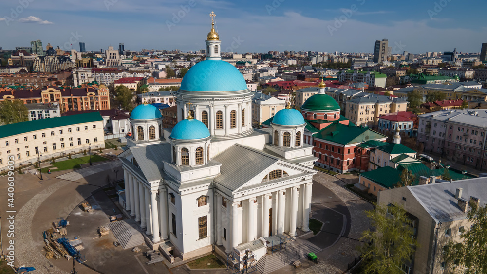 Obraz premium A beautiful church with blue domes. City landscape. Colorful city and church.