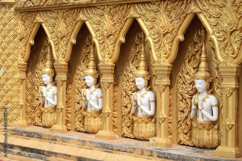 Deva statue in the Thai temple. photo