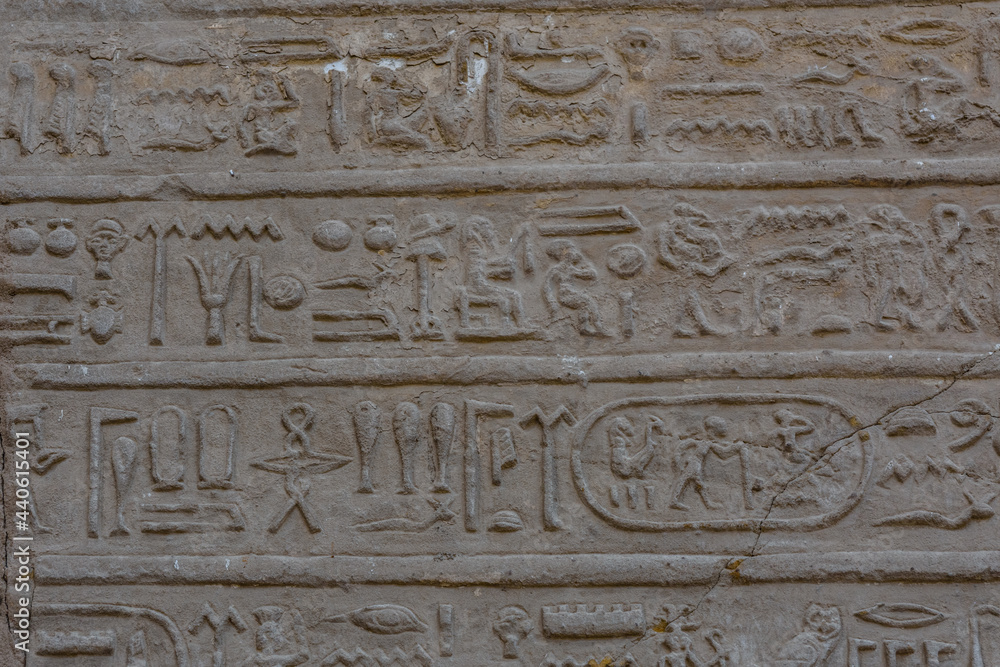 Egyptian ancient hieroglyphs on the stone wall