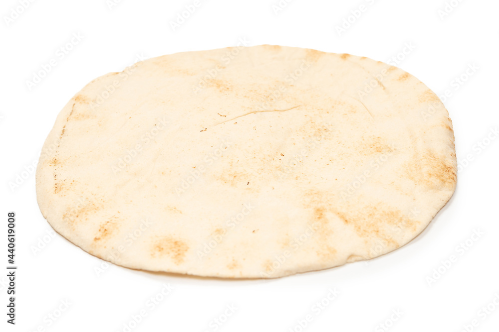 Grilled pitta bread isolated on white background. Grilled pitta bread isolated on white background.