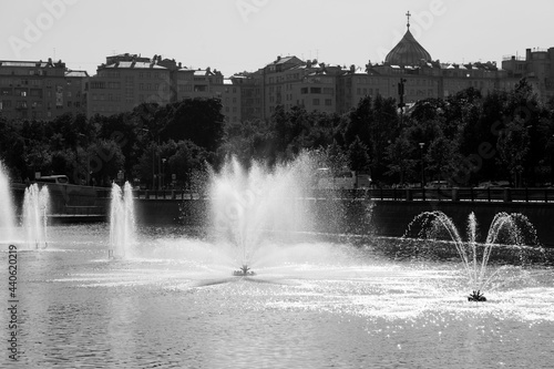 Row of Water fountains in the middle of Moscow river, monochrome Moscow, Russia photo