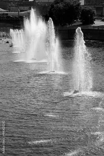 Row of Water fountains in the middle of Moscow river  monochrome Moscow  Russia