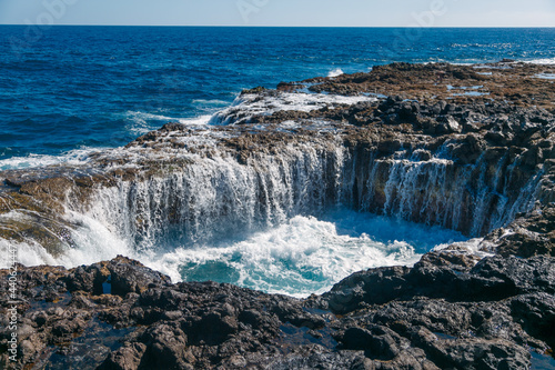 waterfall in a mountain in the ocean in the canary islands
