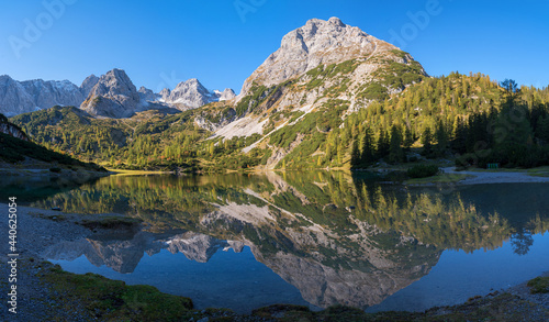 morning scenery lake Seebensee landscape, reflecting mountain range in the water. hiking destination Ehrwald