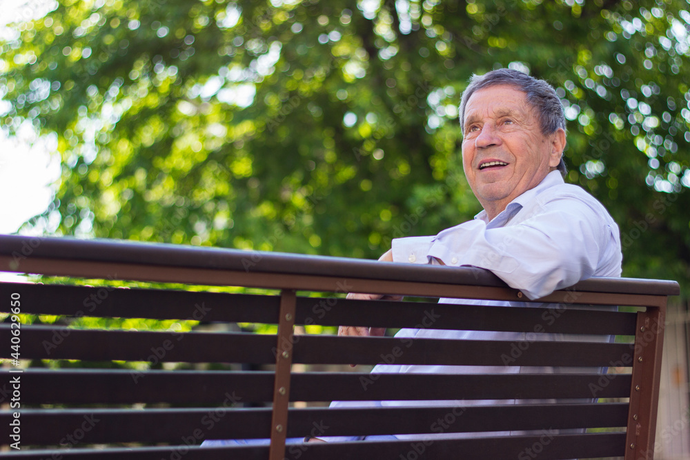 Fototapeta premium Senior man relaxing in the park