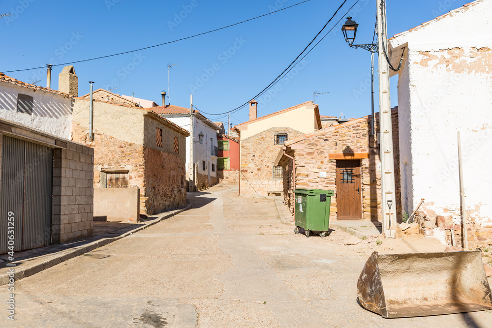 a street with traditional houses in Hombrados village, province of Guadalajara, Castile La Mancha, Spain