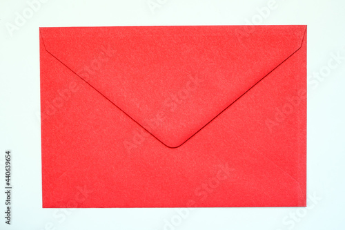 red vintage paper envelope isolated on the white