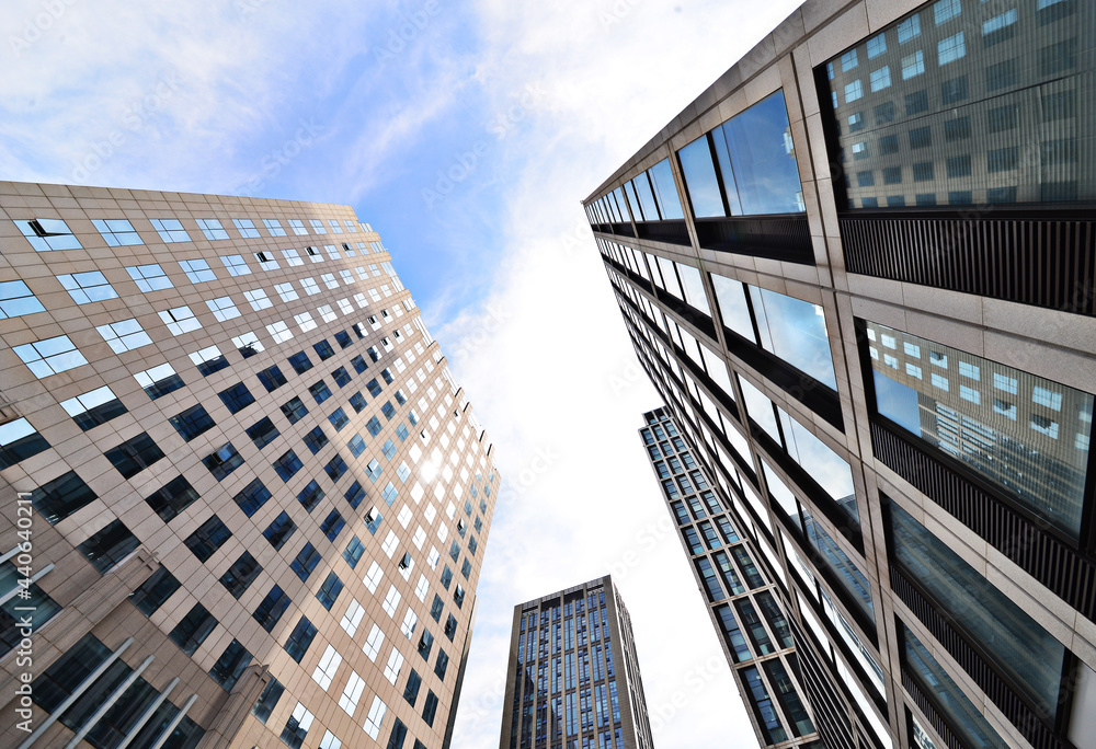 Looking up at business buildings in downtown New York, USA Looking up at business buildings in downtown New York, USA
