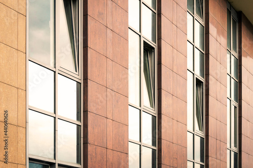 modern building background with rows of glass windows