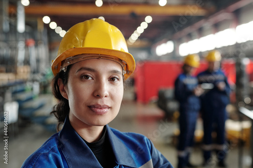 Portrait of mixed race woman working at factory © pressmaster