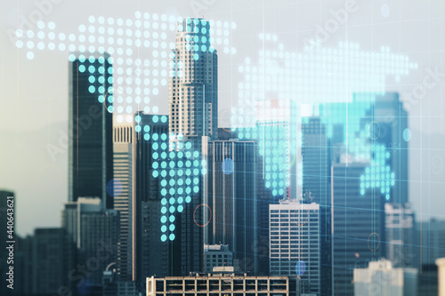 Double exposure of abstract digital world map on Los Angeles city skyscrapers background  research and strategy concept
