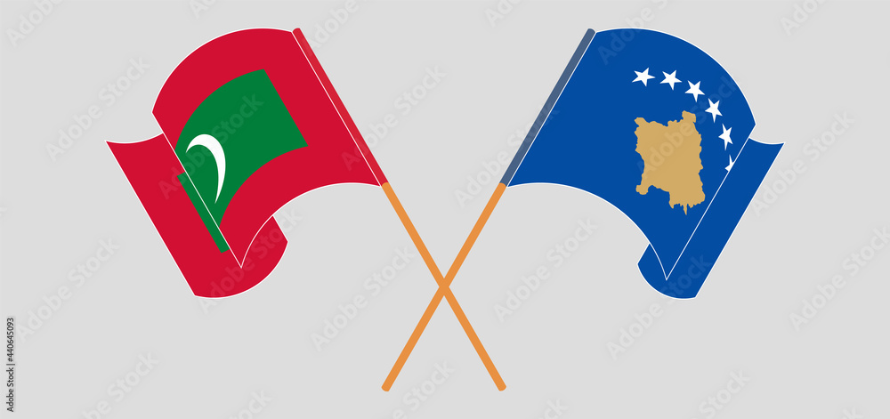 Crossed and waving flags of Maldives and Kosovo Crossed and waving flags of Maldives and Kosovo