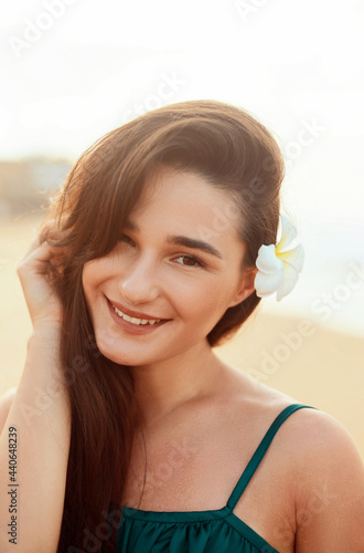 Woman with beauty face touching skin . Beautiful smiling girl model Young smiling woman  portrait. .