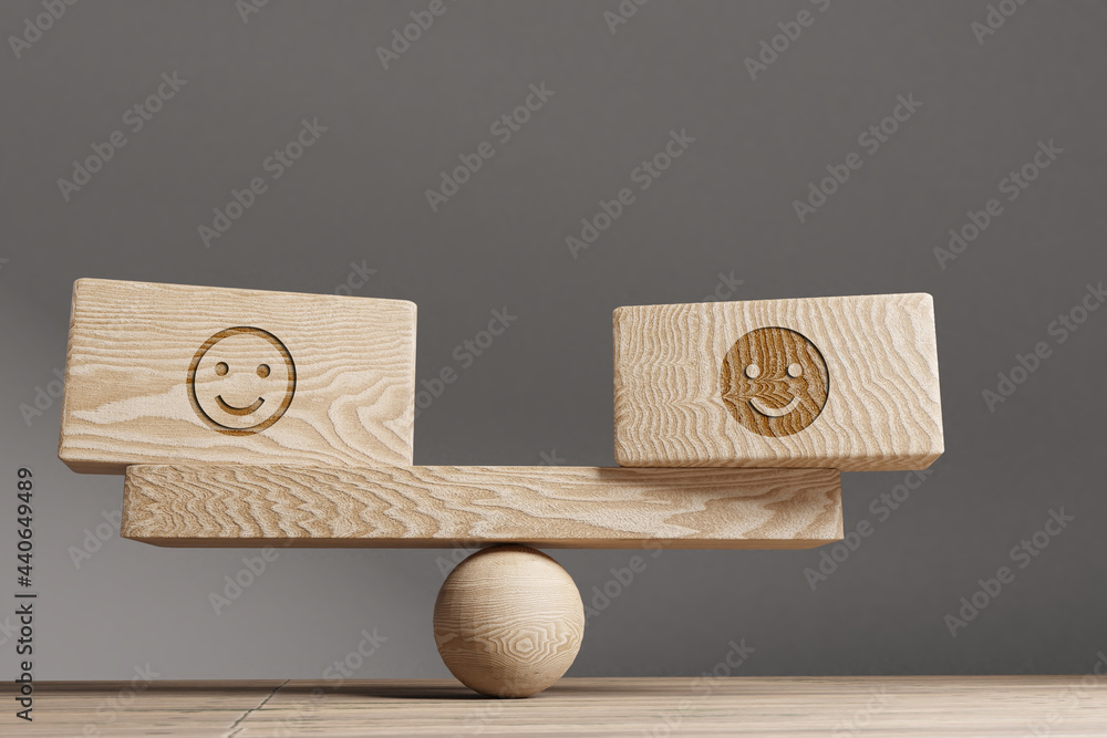 Good and bad mood emoji icons balance concept. Wooden cube block with ...