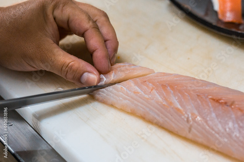 Chef Hands Preparing Sushi Slices Tuna Salmon Sashimi Dish Niguiri Shrimp Knife Black Plate Menu Gourmet Restaurant