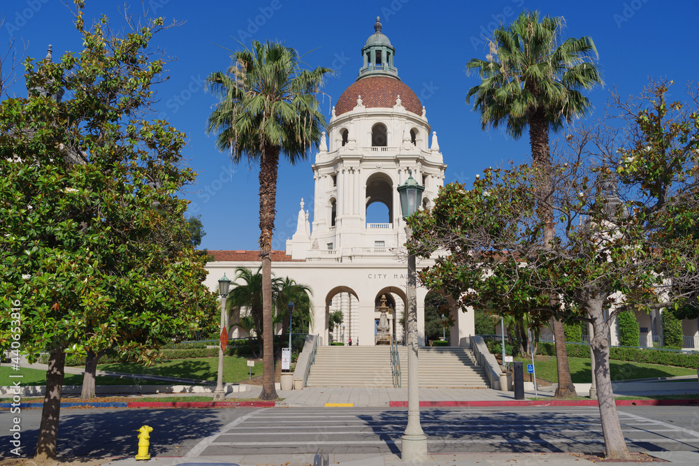 This image shows a view from a street of the landmark Pasadena City Hall building. Pasadena is located in Los Angeles County in Southern California.