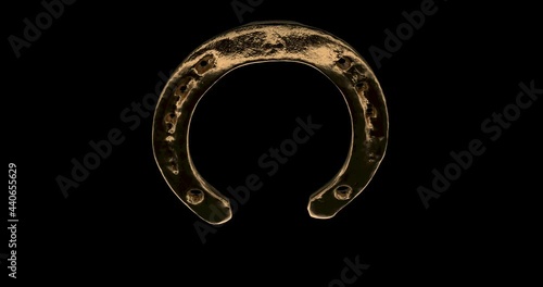 Golden bent horseshoe that was in use. Alpha matte channel.