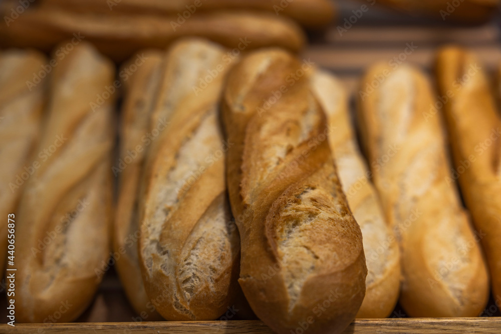 Close up view of white loaves wheat bread on isolated background.