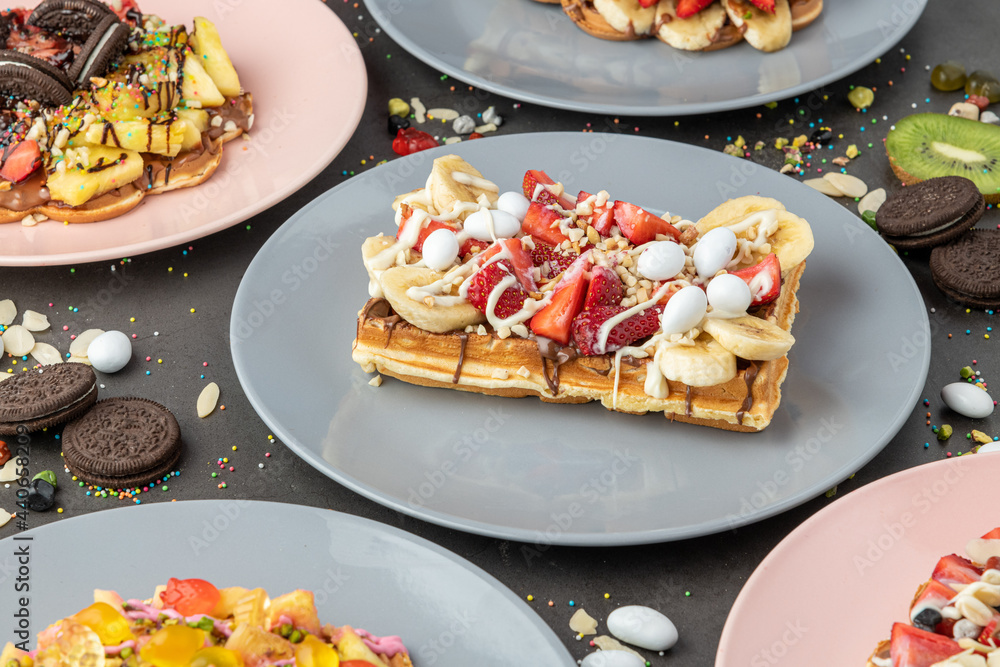 Three different waffles in square, heart and bubble shape. Three different waffles in square, heart and bubble shape.