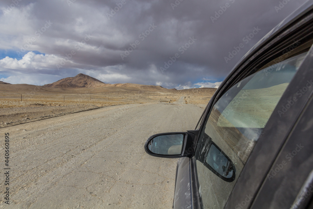 Car driving on Pamir highway, Tajikistan