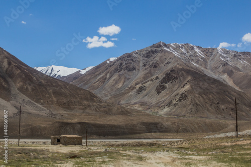 Village house in Gunt river valley in Pamir mountains, Tajikistan photo