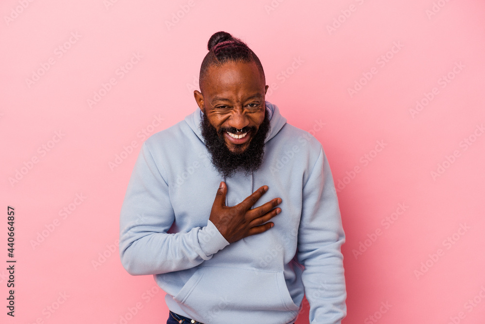 Obraz premium laughs out loudly keeping hand on chest.