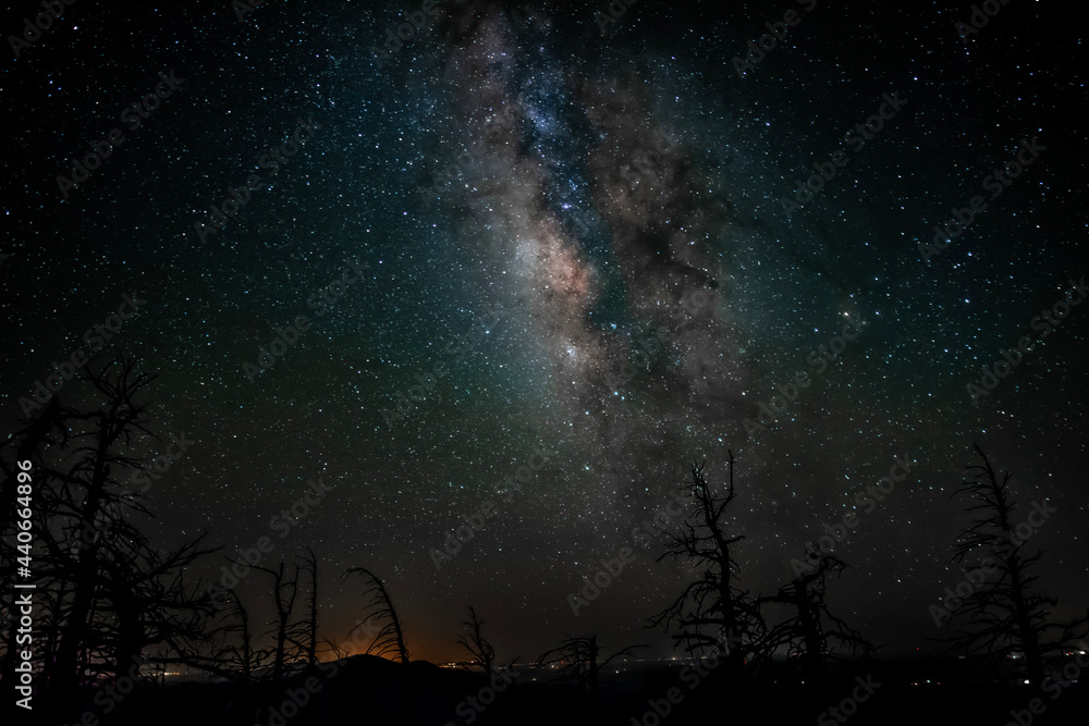 Stars and milky way galaxy shot from peak of mountain at night