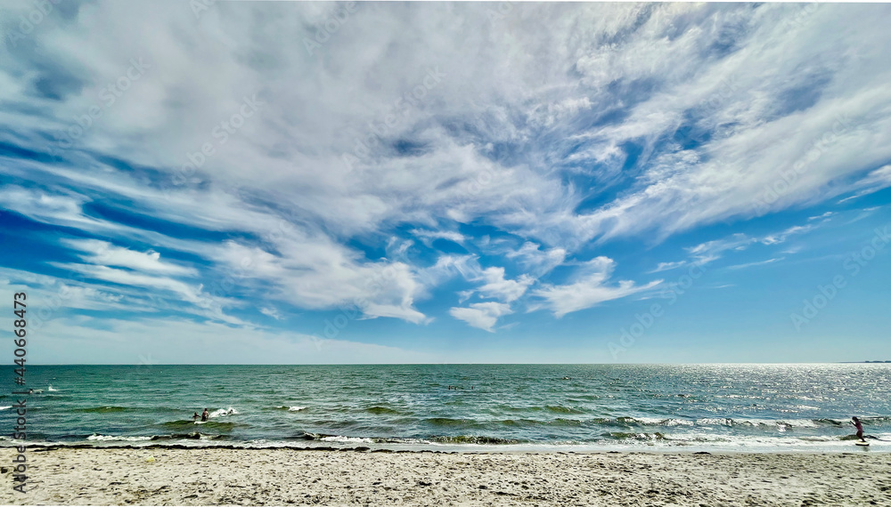 Fototapeta premium Clouds and Sunny Sky Beach at Chatham, Cape Cod