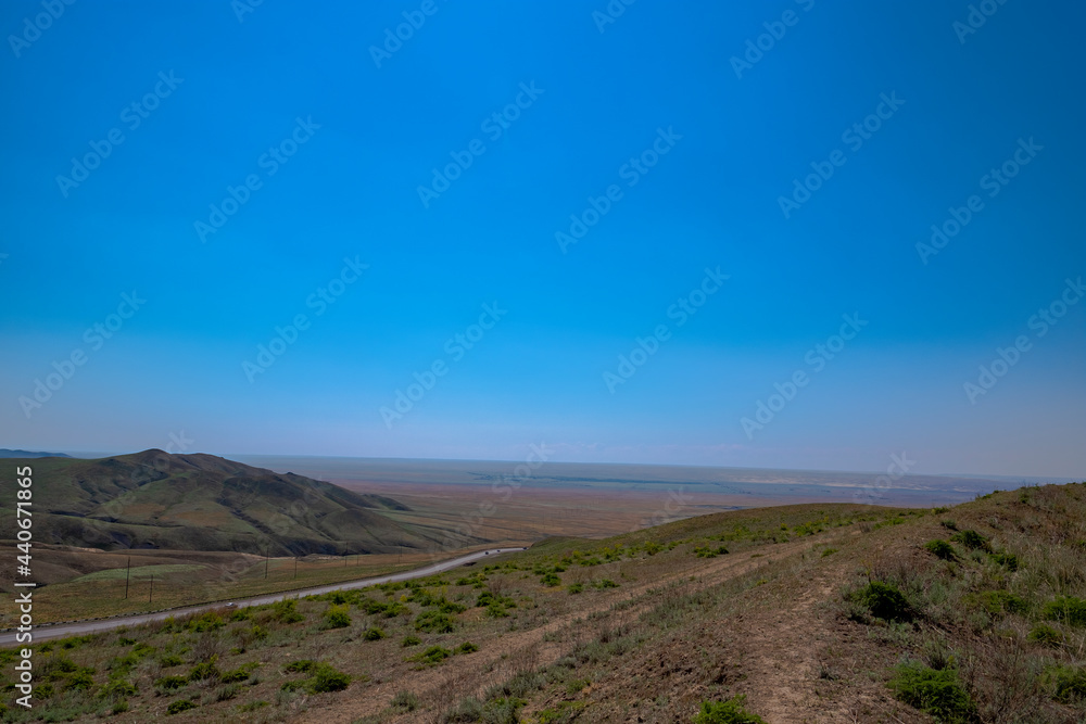 Landscape on the steppe from the height of the mountain range