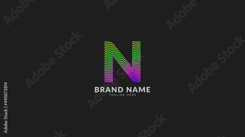 letter N wavy rainbow abstract colorful logo for creative and innovative company brand. print or web vector design element