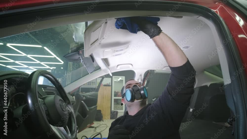 Professional car cleaning. Сar wash. Interior detailing. Dry clean and detail a car interior. Deep seats cleaning. Wiping foam in car wash. Cleaning the car panel from dust. A vacuum cleaner Professional car cleaning. Сar wash. Interior detailing. Dry clean and detail a car interior. Deep seats cleaning. Wiping foam in car wash. Cleaning the car panel from dust. A vacuum cleaner