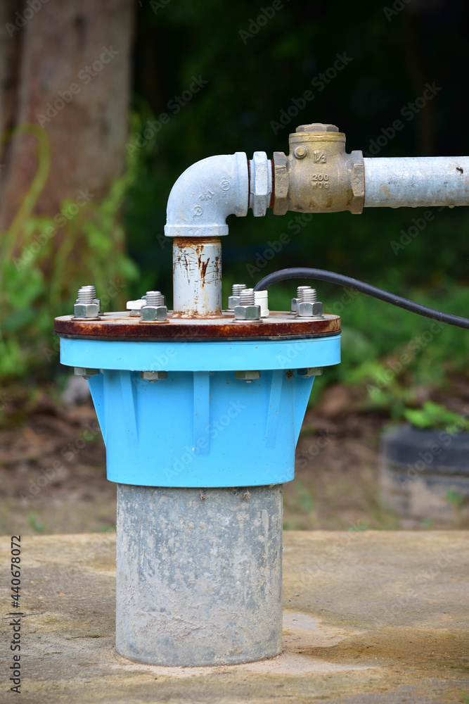 The water flowing artesian well from the land Install the pump ready to use The water flowing artesian well from the land Install the pump ready to use