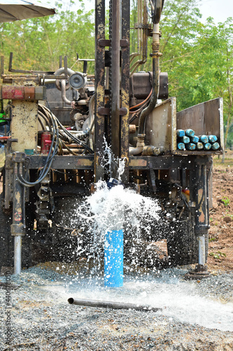 The water flowing artesian well from the land