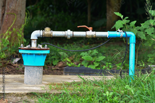 The water flowing artesian well from the land Install the pump ready to use
