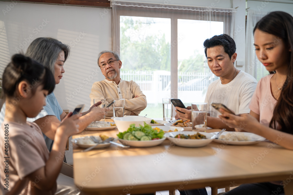 Asian old man feeling bored and unhappy from phone addiction of family
Asian old man feeling bored and unhappy from phone addiction of family