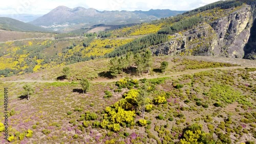 Aerial reveal shot - Fisgas Natural Park Stunning Scenic Views across the mountain ranges - Portugal.  photo