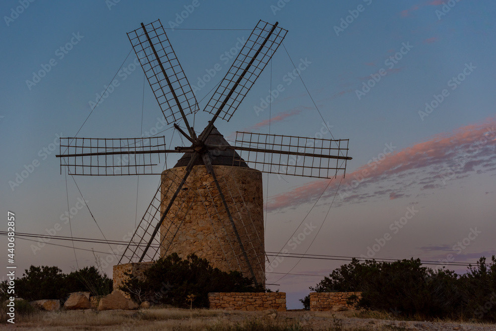 Silhouettes of the mill of Jeroni, Sa Miranda on the island of Formentera in Spain