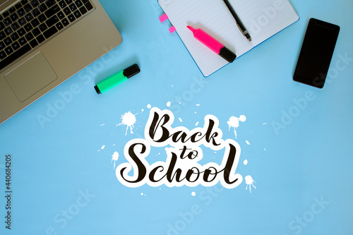 The view from the top. Workspace. Marker, diary or Notepad, pen. Lettering Back to school