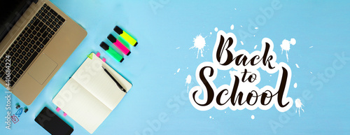 The view from the top. Workspace. Marker, diary or Notepad, pen. Lettering Back to school.